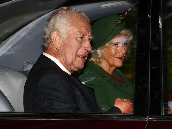 King Charles III and Queen Camilla arrive by car at Crathie Kirk to attend the church service on the second anniversary of the death of Queen Elizabeth II. Picture: Jeff J Mitchell/Getty Images