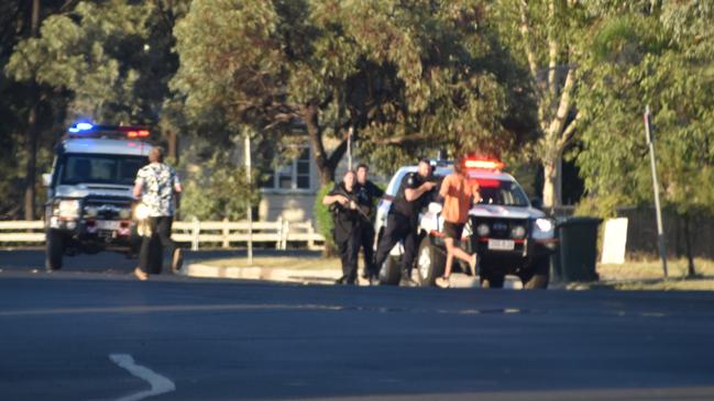 Police during an active shooter situation in Tara. Picture: Chloe Cufflin