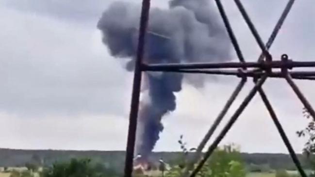 Smoke rises over plane wreckage near the village of Kuzhenkino, Tver region.Picture: AFP.