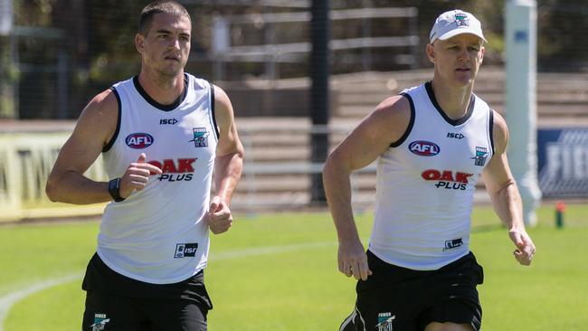 Tom Rockliff will wear No.11 at Port Adelaide this year.