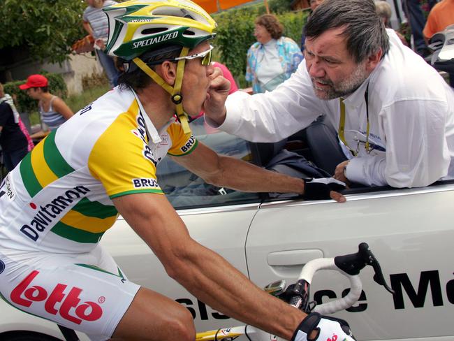 Robbie McEwen given some medicine mid-race in 2005.