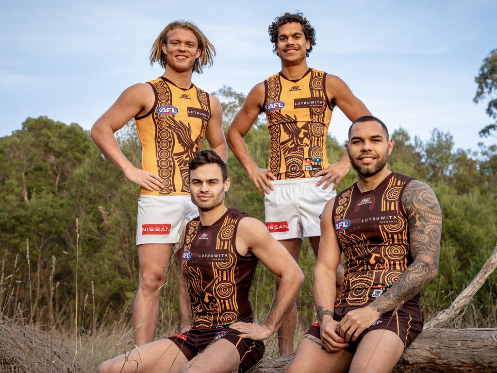 (Back) Cody Anderson, Matt Hill, (front) Karl Amon and Jarman Impey in Hawthorn's Sir Doug Nicholls Round 2025 jumpers. Picture: Hawthorn FC
