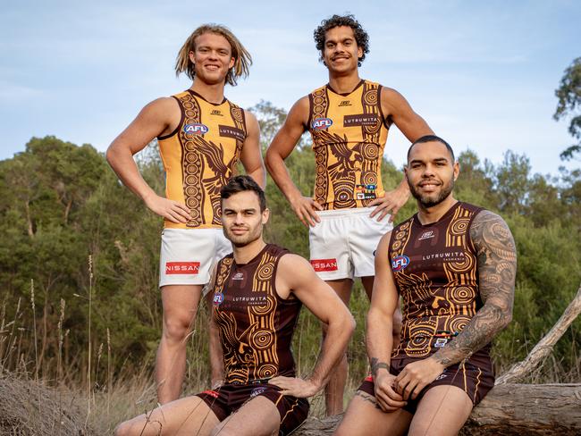 (Back) Cody Anderson, Matt Hill, (front) Karl Amon and Jarman Impey in Hawthorn's Sir Doug Nicholls Round 2025 jumpers. Picture: Hawthorn FC