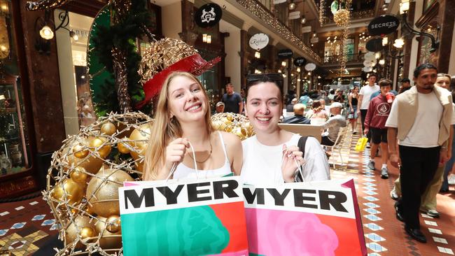 Maisie Gardner and Clara Duffy enjoy a day’s Christmas shopping at Sydney’s upmarket Strand Arcade on Friday. Picture: John Feder/The Australian