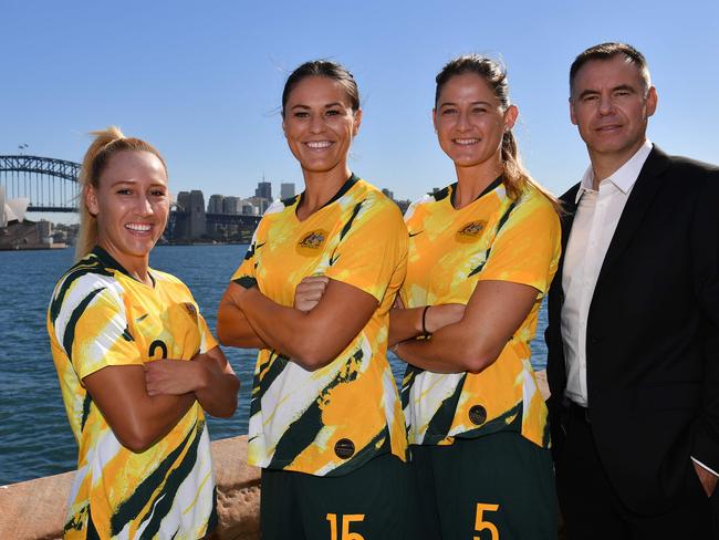 Ante Milicic at his unveiling as the new Matildas coach, alongside players (from left) Gemma Simon, Emily Gielnik and Laura Alleway. Picture: AFP