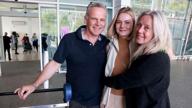 Sophie Kitchen was met by her parents Doug and Helen Kitchen, who she hadn’t seen for more than two years, at Adelaide Airport on Monday. Picture: NCA NewsWire / Kelly Barnes