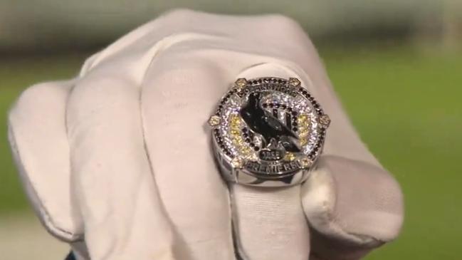 A prototype of Collingwood's 2023 premiership ring.