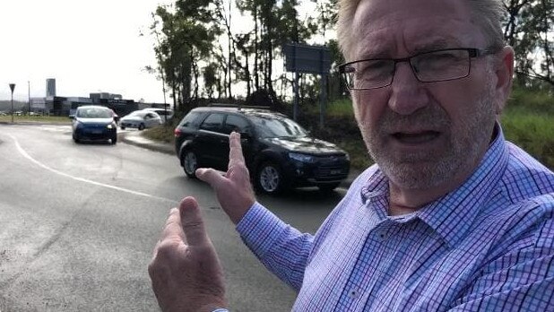 Coomera MP Michael Crandon talking about congestion on ramps near the M1 — a new railway station at Pimpama could help reduce the problem.