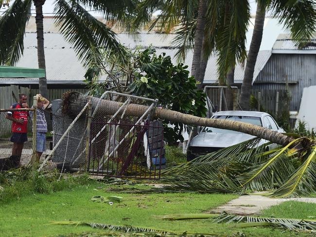 Bowen residents survey the damage after Cyclone Debbie affected the area. Picture: Wesley Monts/News Limited