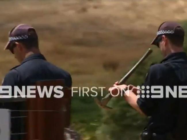 AFP officers on the property. Picture: Channel Nine