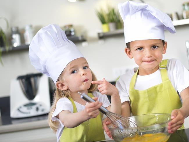 young happy childrens kids family preparing funny cookies in kitchen at home