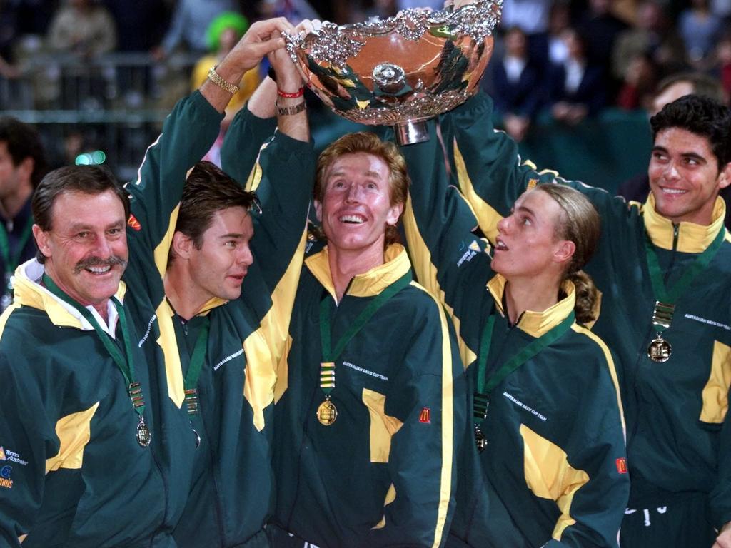 The Australian team holding the trophy after winning Davis Cup final in 1999.