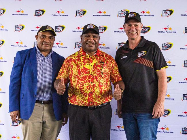 PNG NRL bid chairman Wapu Sonk, Prime Minister James Marape and PNG RL chairman Andrew Hill.