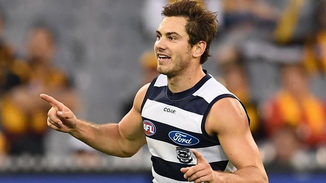 MELBOURNE, AUSTRALIA - APRIL 17:  Daniel Menzel of the Cats celebrates kicking a goal during the round four AFL match between the Hawthorn Hawks and the Geelong Cats at Melbourne Cricket Ground on April 17, 2017 in Melbourne, Australia.  (Photo by Quinn Rooney/Getty Images)