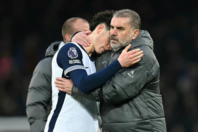 Tottenham's 3-2 defeat at Everton pilled the pressure on Ange Postecoglou (right)