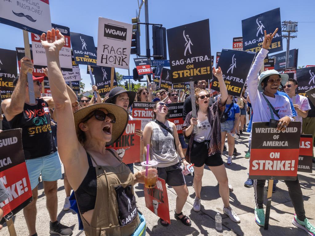 Members of the Hollywood actors SAG-AFTRA union walk a picket line with screenwriters outside of Paramount Studios. The strike lasted for 118 days. Picture: David McNew/Getty Images
