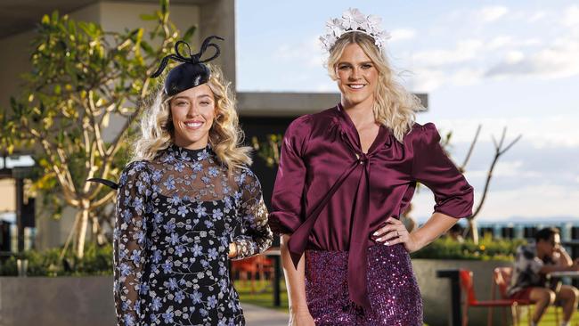 Jockey Emily Lang (left) with Brisbane Racing Club Ambassador, Shayna Jack, at the Queensland winter carnival launch in April. Picture: Josh Woning