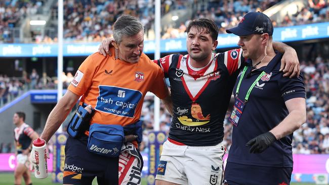 SYDNEY, AUSTRALIA – SEPTEMBER 01: Brandon Smith of the Roosters is helped off the field with an injury during the round 26 NRL match between Sydney Roosters and Canberra Raiders at Allianz Stadium, on September 01, 2024, in Sydney, Australia. (Photo by Cameron Spencer/Getty Images)