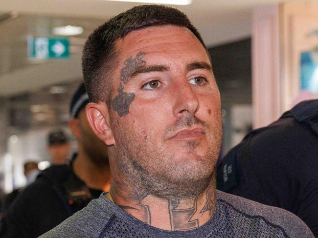 SYDNEY, AUSTRALIA - NewsWire Photos FEBRUARY 10, 2023: Comanchero boss Allan Meehan has been extradited from Queensland and arrived at Sydney Airport under a heavy police presence. Picture: NCA NewsWire / David Swift