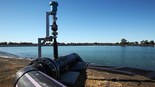 A pipe runs into a holding pond at the Santos Leewood water treatment facility in Narrabri. Picture: Getty