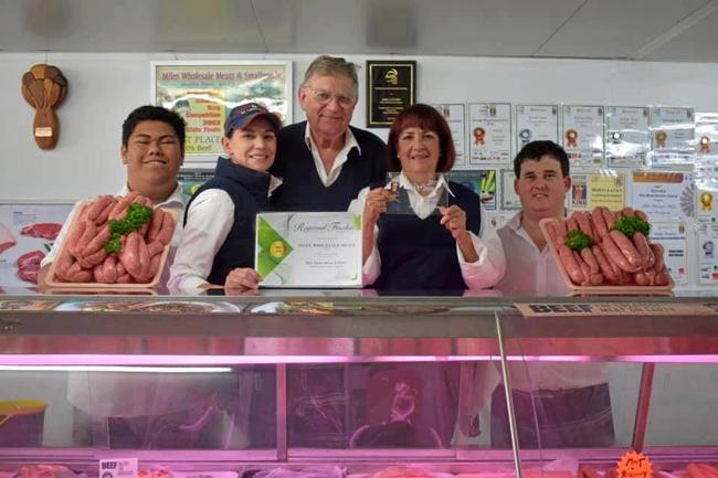 SAUSAGE ROYALTY: Miles Wholesale Meats and Smallgoods staff: school-based Max Andrews, apprentice Jess Eland, owners Daryl and Lyn Bein, and butcher Matt Tong. Picture: Brooke Duncan