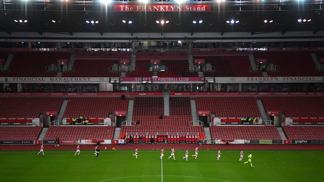 Stoke City players walk out onto the pitch prior to the match against Sheffield Wednesday in an empty stadium in Stoke on Trent, England, on Wednesday. Picture: Getty Images