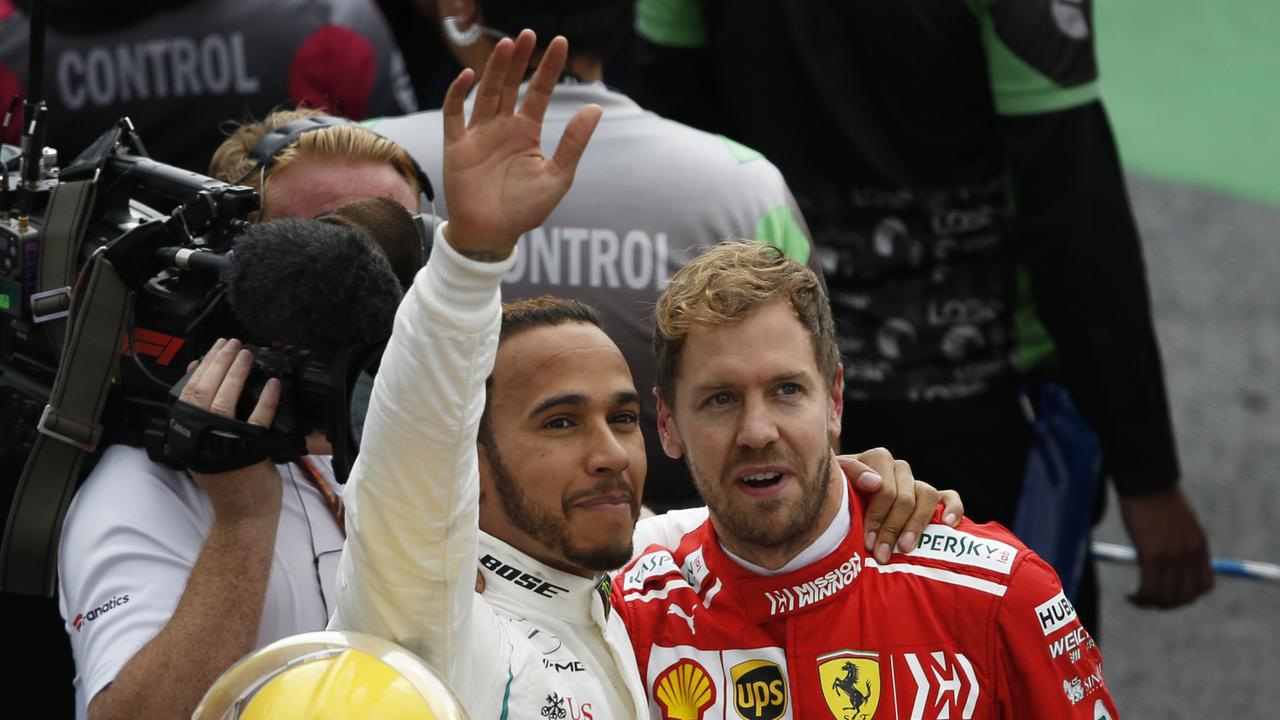 Sebatian Vettel congratulated his rival on a fifth world title to overtake him on the all-time list.