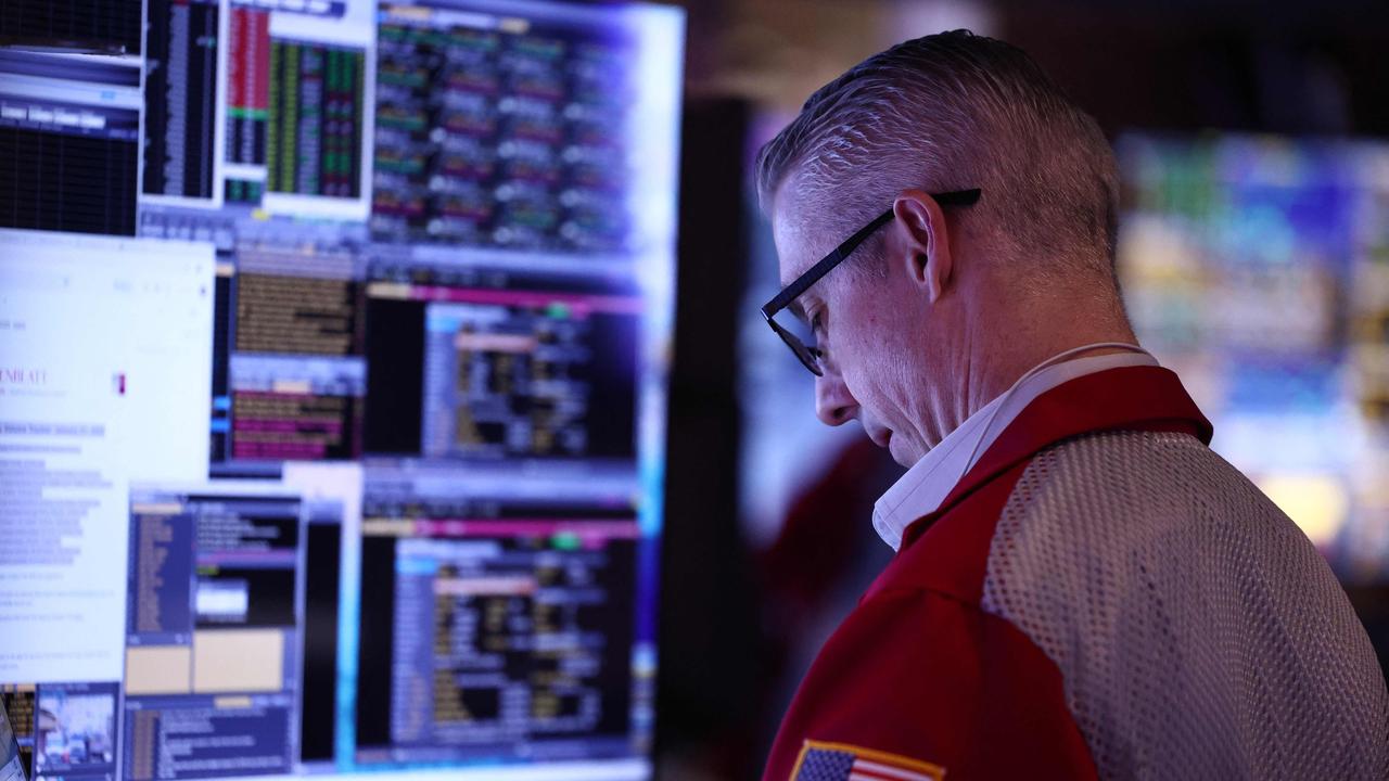 Traders work on the floor of the New York Stock Exchange. Picture: Michael M. Santiago/AFP