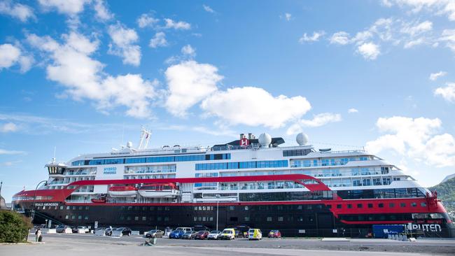 Hurtigruten’s cruise ship the Roald Amundsen moored at a quay in Tromso, northern Norway, after crew and passengers tested positive. Picture: AFP