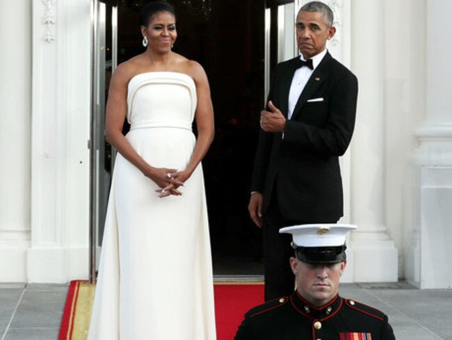 Spot the difference. Michelle and Barack Obama during a State visit in 2016. She is wearing a Brandon Maxwell dress. He is wearing THE tuxedo. Picture: Chip Somodevilla/Getty Images
