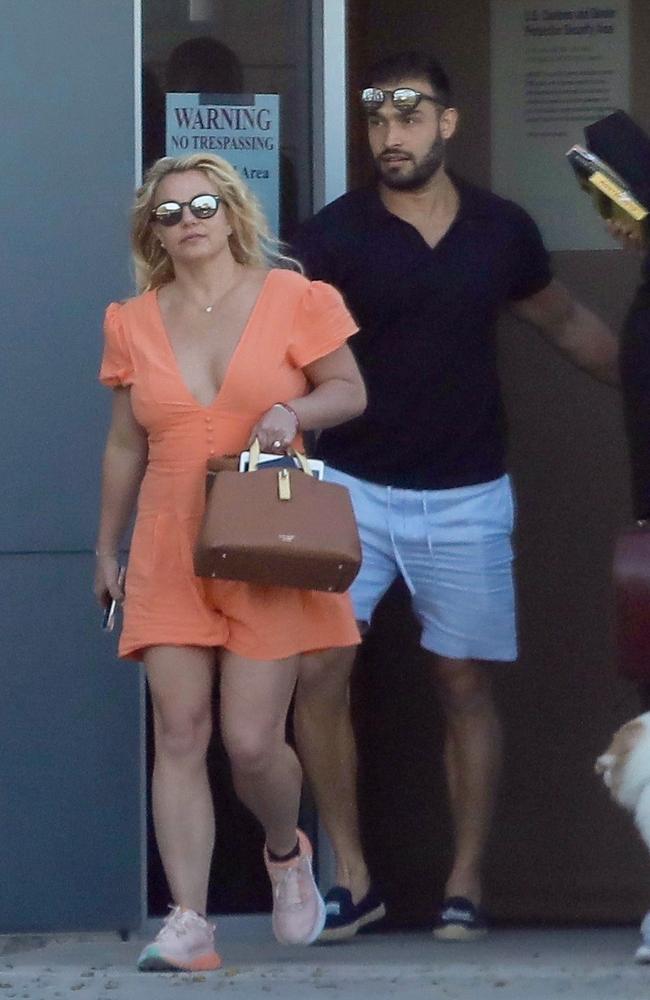 Britney and her partner Sam Asghari pictured at Los Angeles airport on April 8, 2022. Picture: BENS / BACKGRID