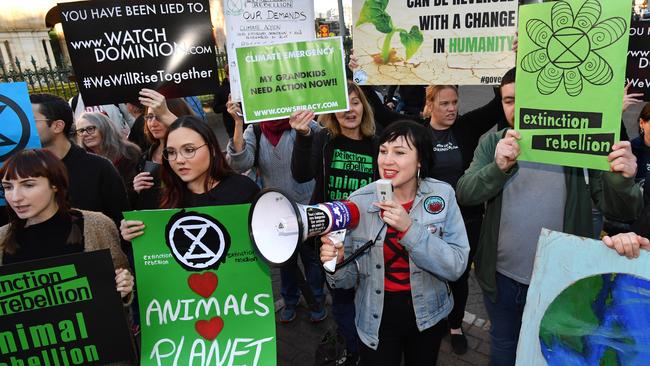 Extinction Rebellion protesters are seen outside Queensland Parliament House in Brisbane. Picture: AAP Image/Darren England