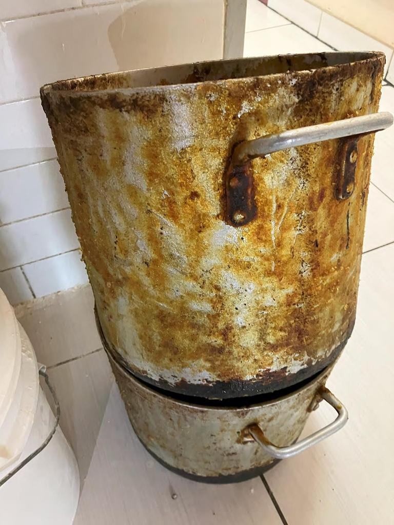 Metal racks, utensils and surfaces displayed caked-on grime and food build-up. Photos: Supplied by Courts SA