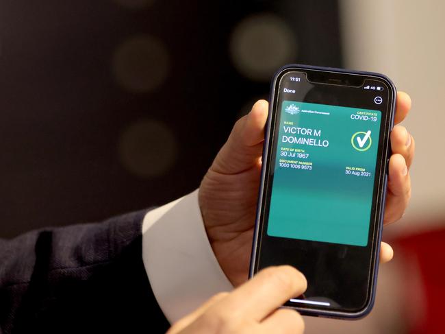 SYDNEY, AUSTRALIA - NewsWire Photos SEPTEMBER 22, 2021. Minister for Customer Service Victor Dominello pictured showing how the vaccine passport looks on an app after a COVID-19 update press conference in St Leaonards.Picture: NCA NewsWire / Damian Shaw