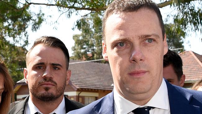 Wests Tigers NRL player Josh Reynolds (left) with solicitor Daniel McGirr. (AAP Image/Bianca De Marchi)