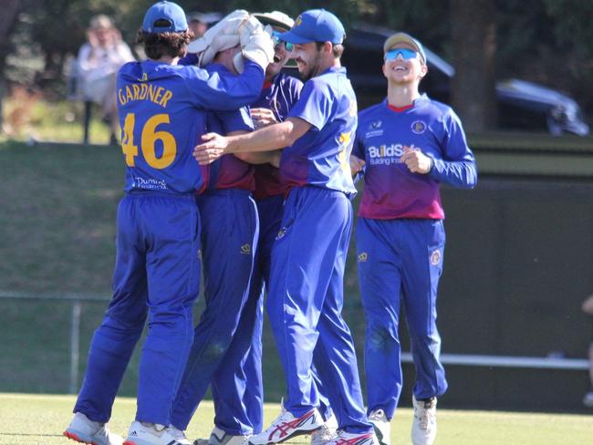 Frankston Peninsula players celebrate after beating Melbourne. Picture: Glenn Davey