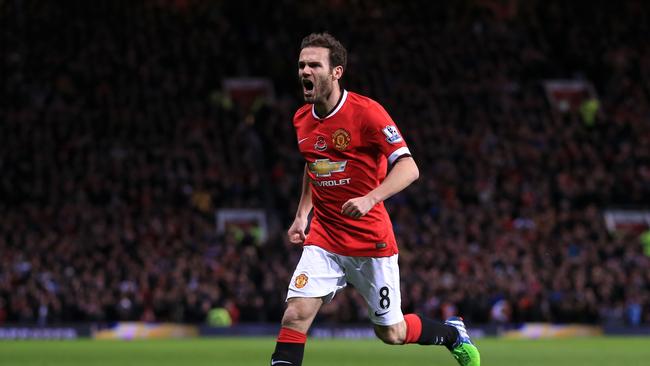 Manchester United's Juan Mata celebrates scoring his side's opening goal.