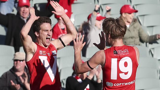 Thomas Schwarz celebrates his goal with Lewis Hender. Picture Sarah Reed