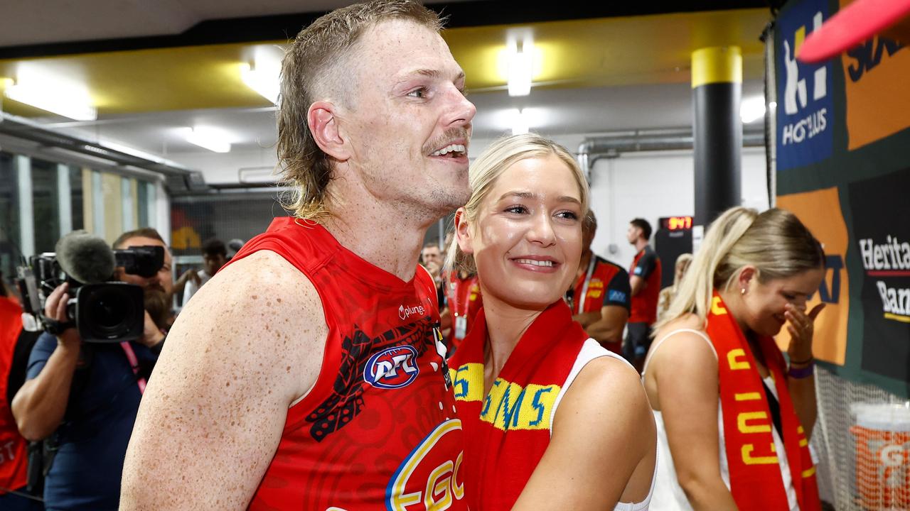 Nick Holman of the Suns celebrates with his partner Ellen during the 2023 AFL Round 11 match between the Gold Coast Suns and the Western Bulldogs at TIO Stadium. (Photo by Michael Willson/AFL Photos via Getty Images)