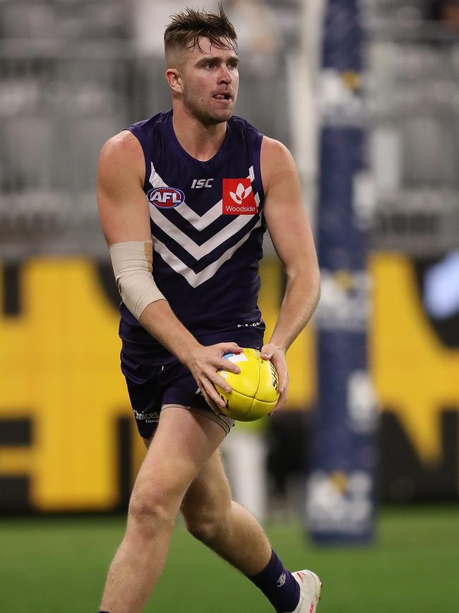 PERTH, AUSTRALIA – AUGUST 10: Luke Ryan of the Dockers in action during the round 11 AFL match between the Fremantle Dockers and the Hawthorn Hawks at Optus Stadium on August 10, 2020 in Perth, Australia. (Photo by Paul Kane/Getty Images)