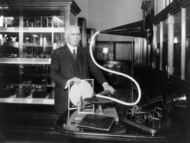 German-American inventor Emile Berliner, in 1920, with the model of the first phonograph machine he invented.