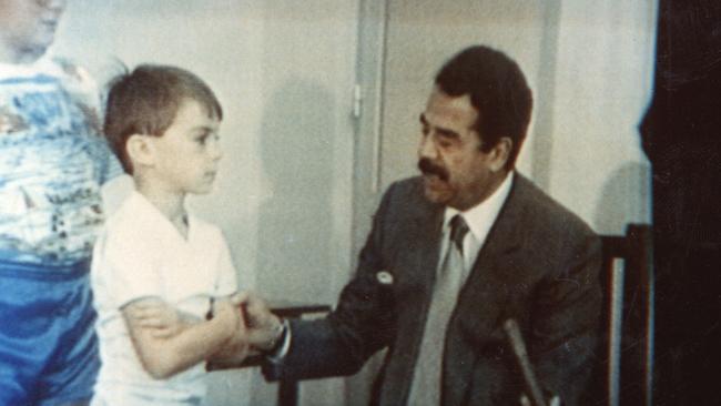 Saddam Hussein in 1990 with Western child hostages during the Iraqi occupation of Kuwait.