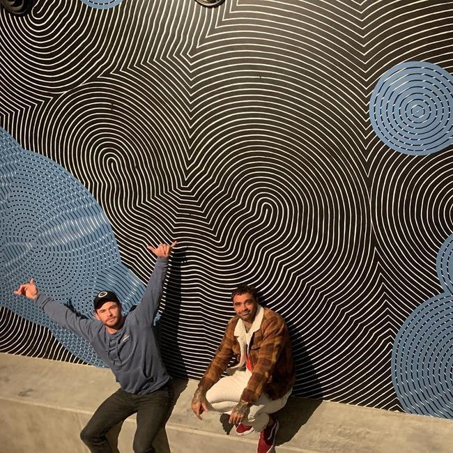 Chris Hemsworth hired Indigenous artist Otis Hope Carey (right) to create a stunning mural in his Byron bay manson. Picture: Instagram