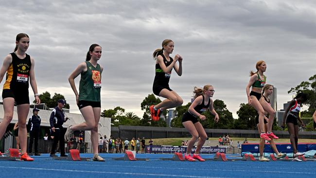 Athletes prepare before the U16 Women 100m.