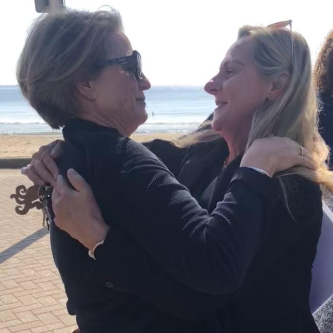 Katherine Smith (left), of Kurraba Poi and Melissa Pye embrace on Tuesday at Manly Beach, first time they had seen each other since the rescue. Picture: Jim O’Rourke