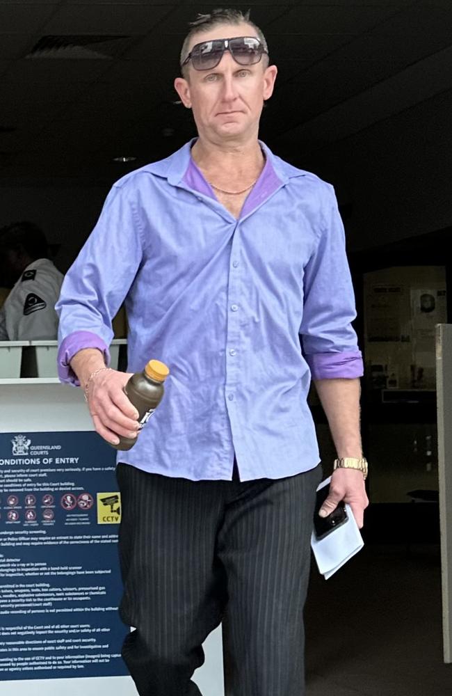 Taylor outside court with his Ice Break triple shot iced coffee.