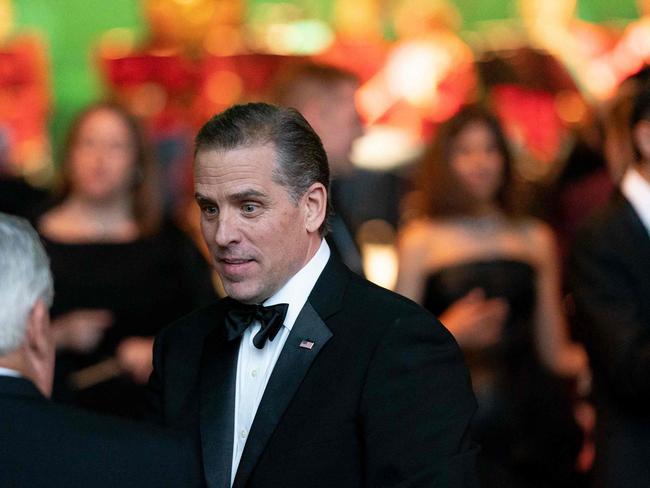 Hunter Biden should stay home but his father will probably invite him anyway. Picture: Stefani Reynolds (AFP)