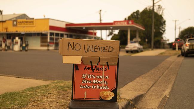 A sign at a petrol station in Moruya showing they ran out of unleaded petrol. Picture: Sean Davey