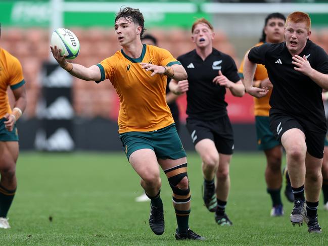 John Grenfell of Australia takes the ball during the match between Australia U18s and New Zealand Schools at FMG Stadium Waikato (Photo by Fiona Goodall/Getty Images for Rugby Australia)