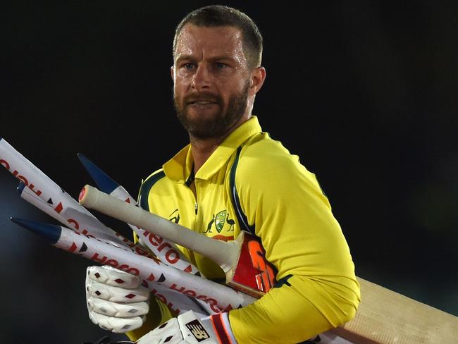 Australian cricketer Matthew Wade leaves the grounds with the stumps after victory in the fourth one day international (ODI) cricket match between Sri Lanka and Australia at The Rangiri Dambulla International Cricket Stadium in Dambulla on August 31, 2016. / AFP PHOTO / ISHARA S.KODIKARA